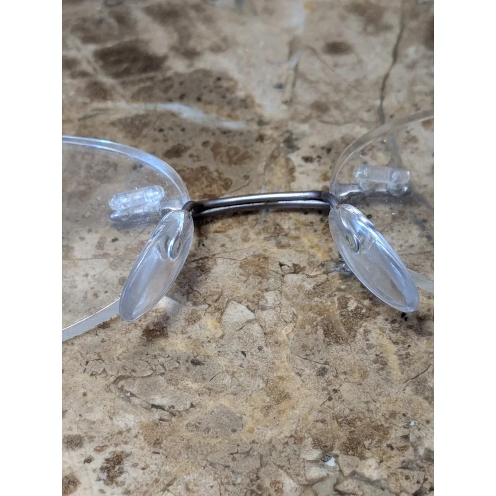 Silhouette Eyeglasses 4476 40 6053 52[]17 135 5416 Titan Creme Rimless Austria